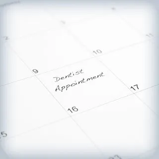 'Dentist appointment' written on a calendar